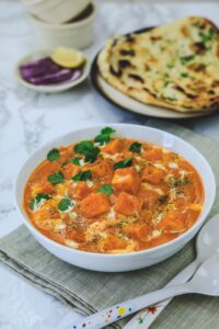 Paneer Naan with Butter Sauce